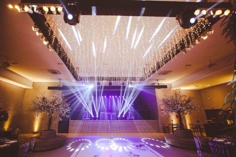 Wedding reception with elegant table settings and floral centerpieces