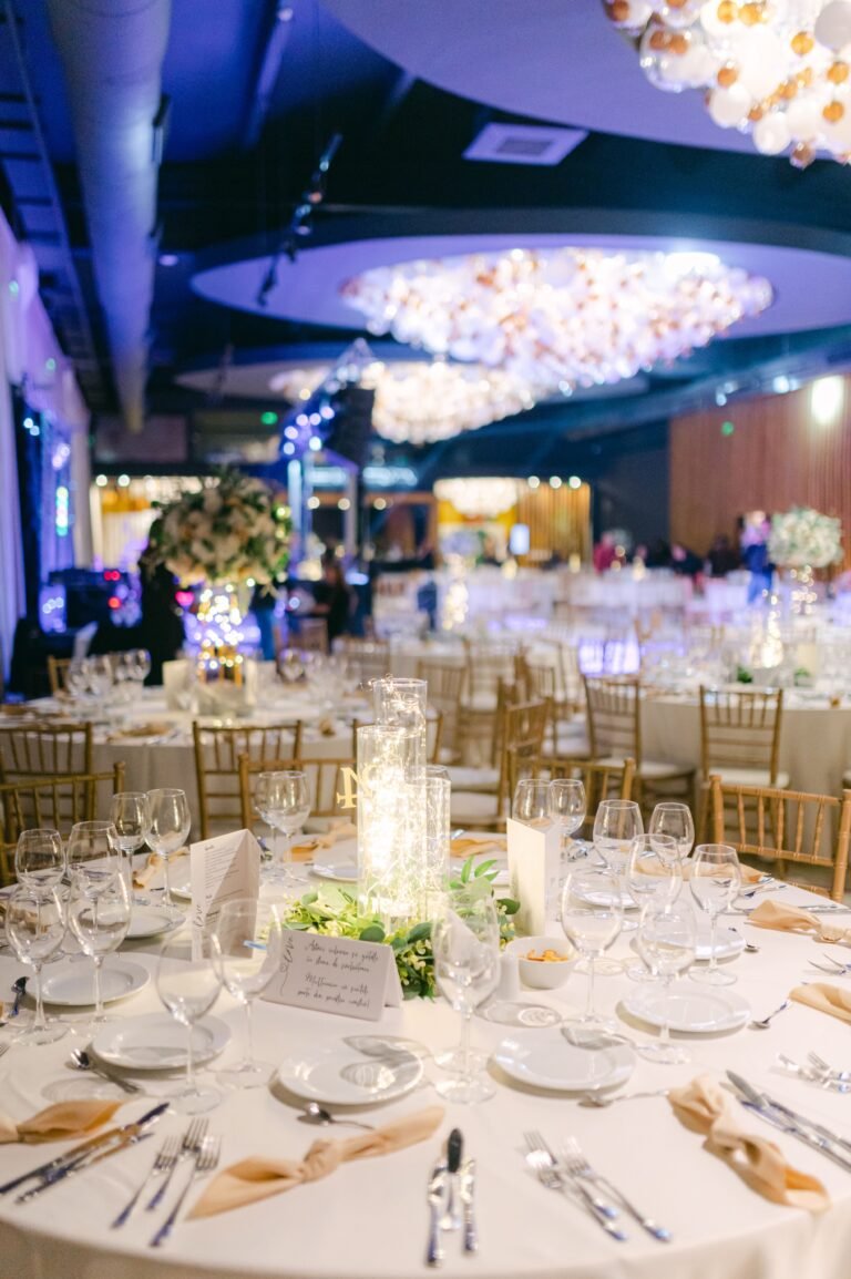 Luxury wedding reception venue with dramatic lighting