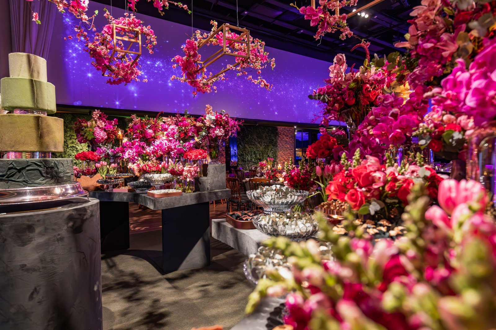 Floral arrangements and candles at an elegant reception foyer