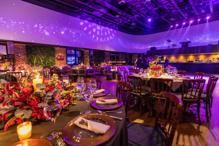 Luxurious wedding venue table setting with floral centerpieces