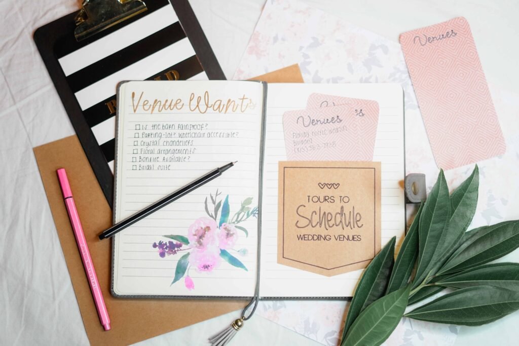 Wedding planning journal and stationery flat lay